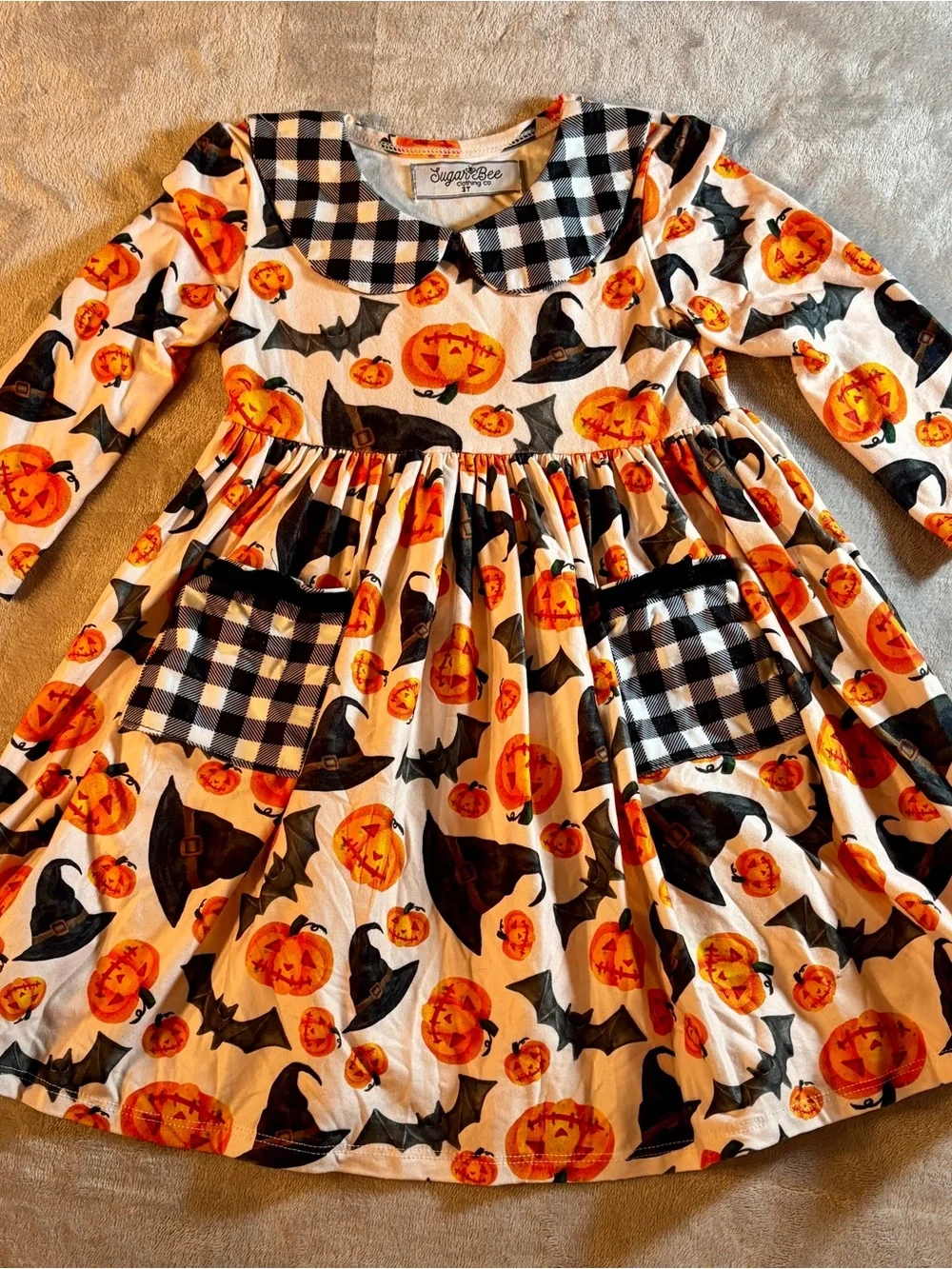 Girls' Orange Pumpkin Halloween Dress with Black Gingham Trim